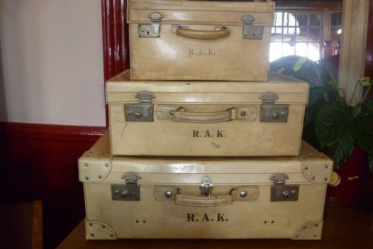 SET OF THREE VINTAGE VELLUM SUITCASES