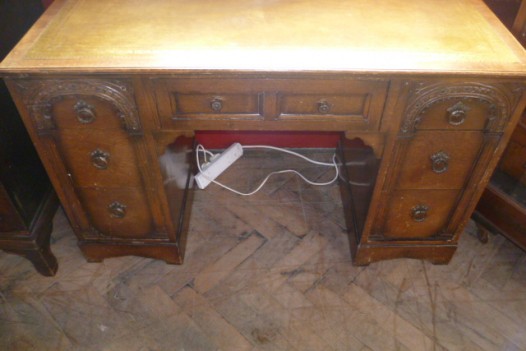 CARVED OAK KNEE HOLE DESK