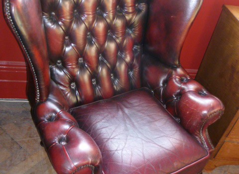 DEEP BUTTONED LEATHER WING ARMCHAIR