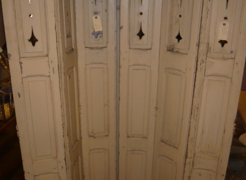 PAIR OF ANTIQUE PAINTED FRETWORK SHUTTERS