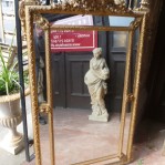 LARGE DECORATIVE ANTIQUE GILT CUSHION MIRROR