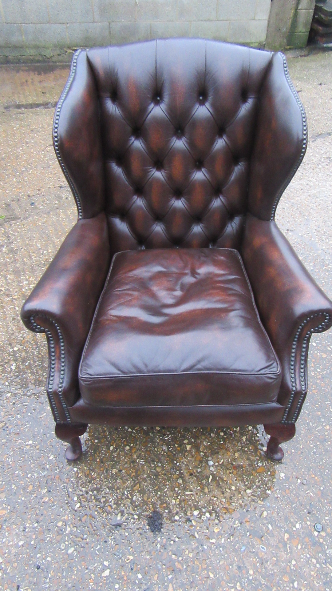 ANTIQUE STYLE DEEP BUTTONED LEATHER WING ARMCHAIR