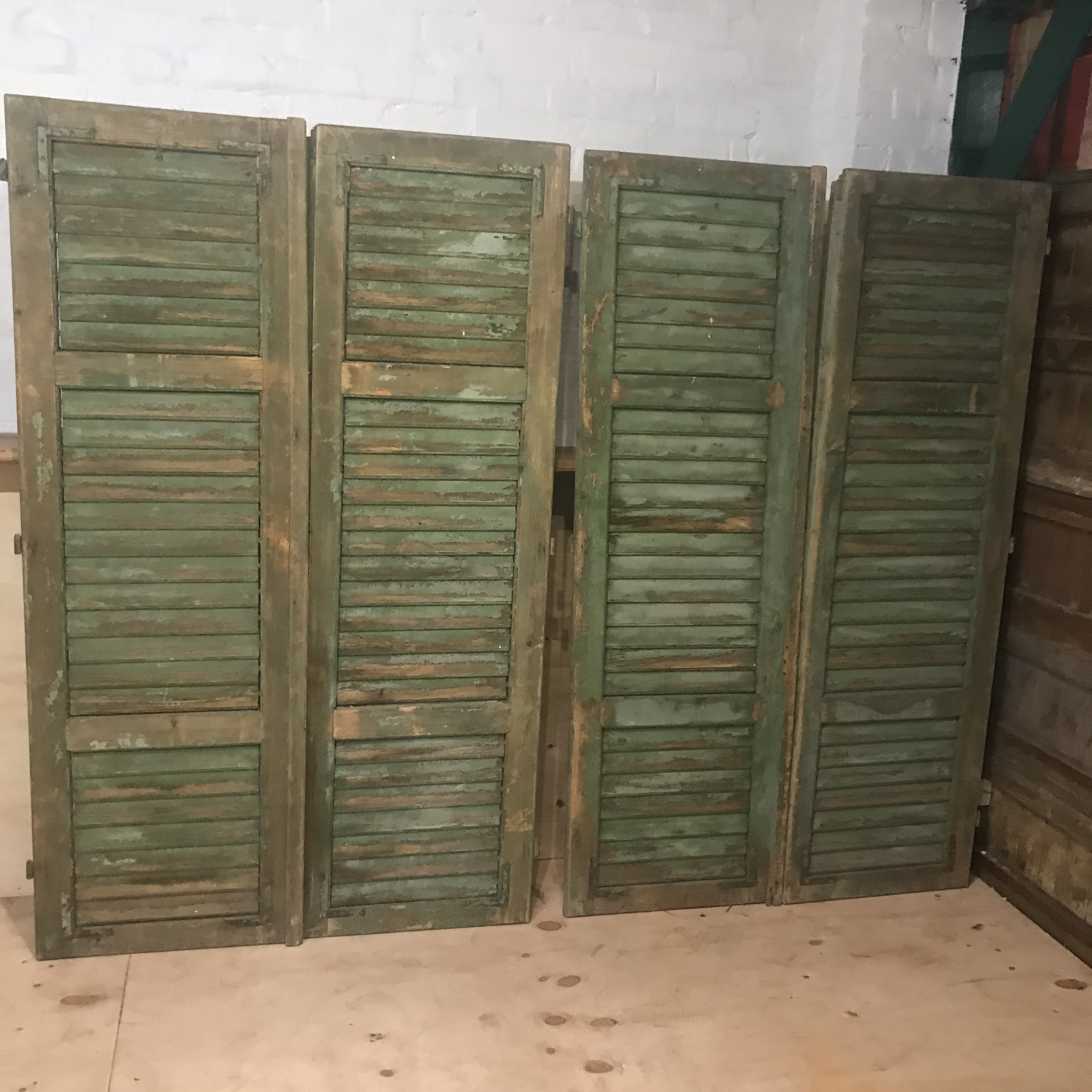 TWO PAIRS OF FRENCH ANTIQUE SHUTTERS IN THE ORIGINAL PAINT